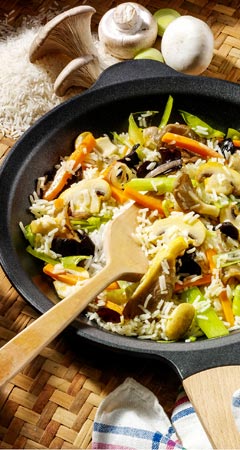 Vegetarische Reispfanne mit Pilzen